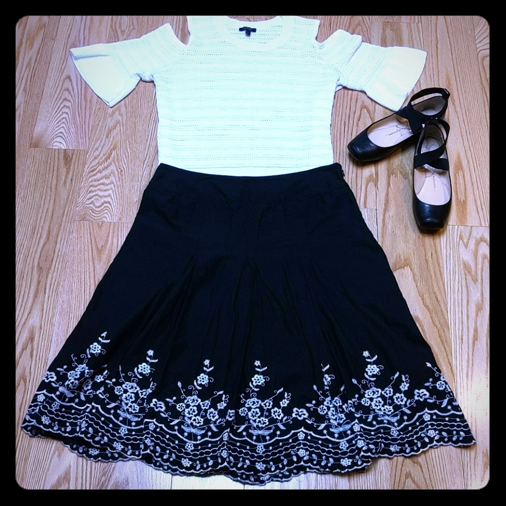 Black skirt with white floral embroidery